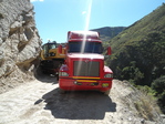 TRANSPORTE DE MAQUINARIA PESADA EN CAMA BAJA, PLATAFORMA Y OTROS
