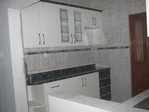 REPOSTERO DE MELAMINE CON PUERTAS POST FORMADAS